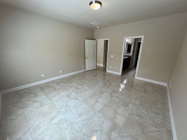 Building Photo - A Fantastic 4 Bedroom Home with the primary Downstairs, in Silverado Ranch