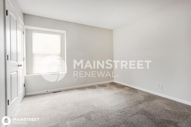 Building Photo - 411 Wiltshire Dr, Raymore, MO 64083