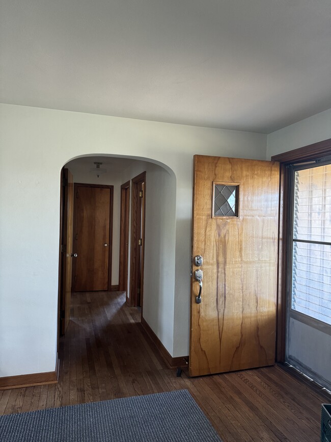 Hallway to bedrooms and bathroom with two closets, right off of living room - 620 Horn Rd