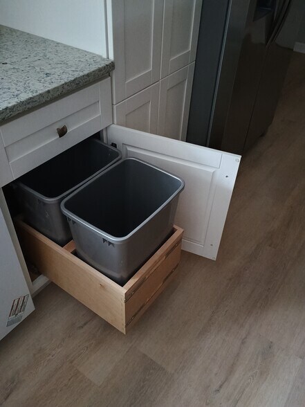 Pull out trash cans. - 1618 N Rural St