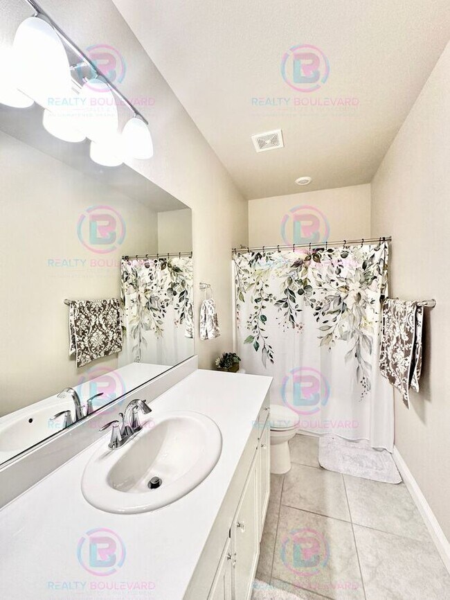 Building Photo - Welcome to your dream home, where modern elegance meets unparalleled convenience!