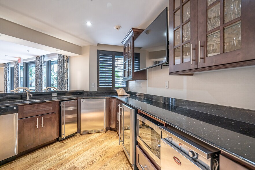 Kitchen in Social room - 801 S Olive Ave