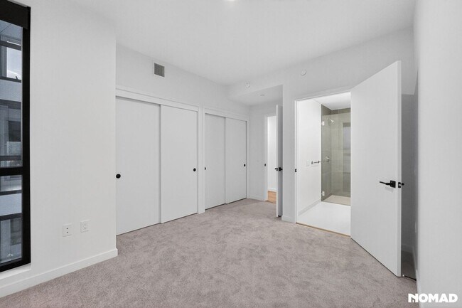 Building Photo - Act Fast: Luxury SoMa Corner Unit w/ EV Parking & Views