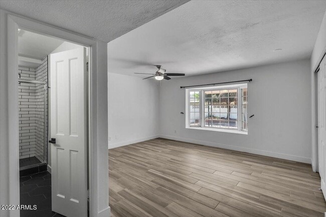 Building Photo - 8207 E Montebello Ave