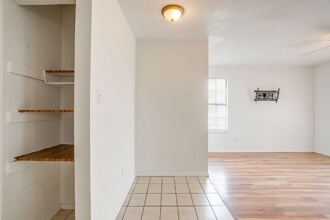 Building Photo - Charming 2-Bedroom Duplex Retreat on White...