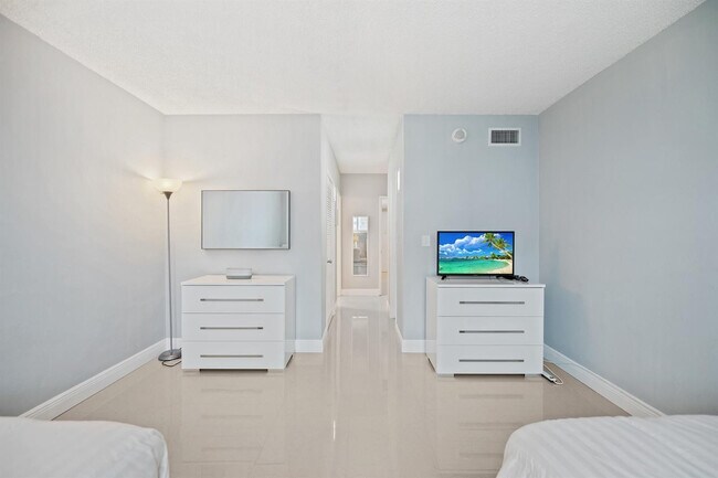 Building Photo - 19380 Collins Ave