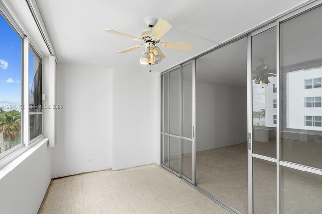 Building Photo - 5005 Collins Ave
