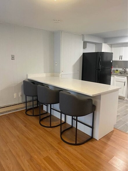 Basement Kitchen Island - 9110 Drake Pl