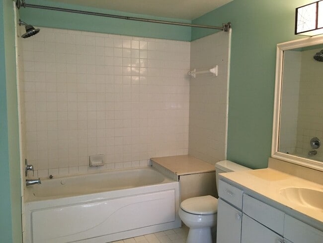 Building Photo - Midtown 2 story condo. Over 1200 sq ft of living space! Fenced in back yard! Pets are owner's app...