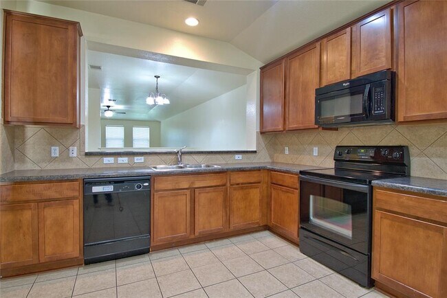 Building Photo - 7749 Squirrel Hollow Dr