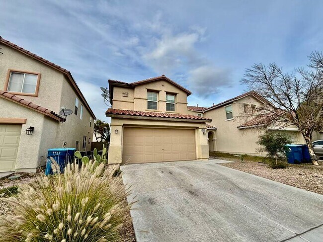 Building Photo - Welcome to this charming 4 bedroom, 2.5 bathroom home.