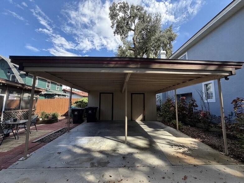 Carport with large, lockable storage - 1010 Delaney Ave