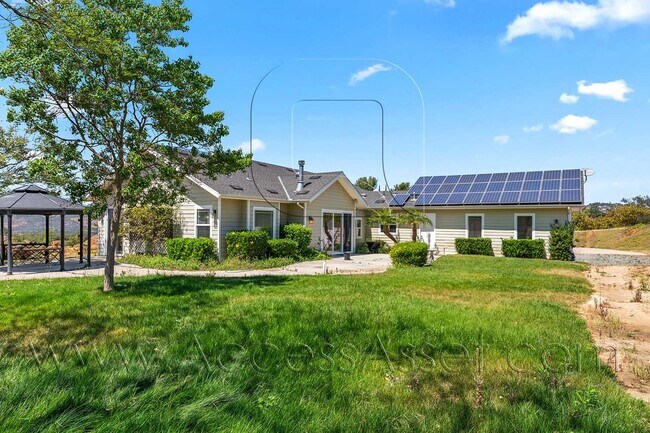 Building Photo - Designer Single-Story Home with Gourmet Kitchen & Mountain Views