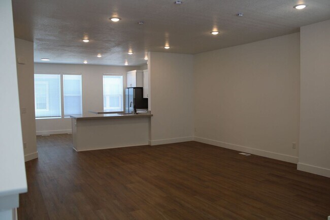 Building Photo - 3-bedroom, 2.5-bath townhome offering modern living in an unbeatable location.
