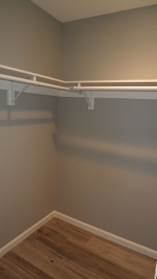 Building Photo - REMODELED 2BR; 1BA end unit condo w/ 1 car garage & 1 parking space