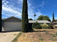Building Photo - 4 Bedroom 2 Bath Home Freshly Painted With New Landscaping Underway