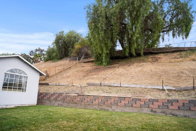 Building Photo - 4 Bed | 2.5 Bath Home in Spring Valley with Detached Office Suite!
