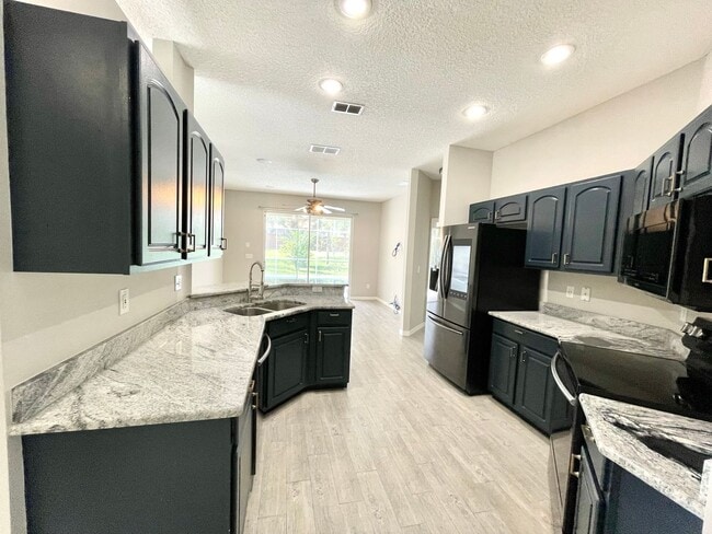 Building Photo - Gorgeous 3/2 Pool Home in Apopka's Parkside at Errol Estate!