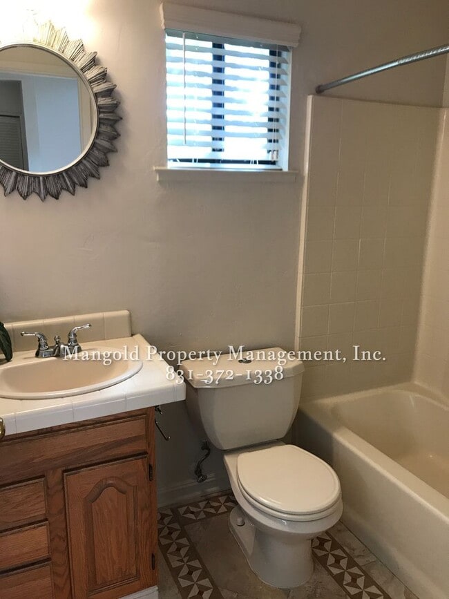 Building Photo - Charming Two-Story 2-Bed 2-Bath Home with Wrap-Around Balcony & Hardwood Floors in Seaside