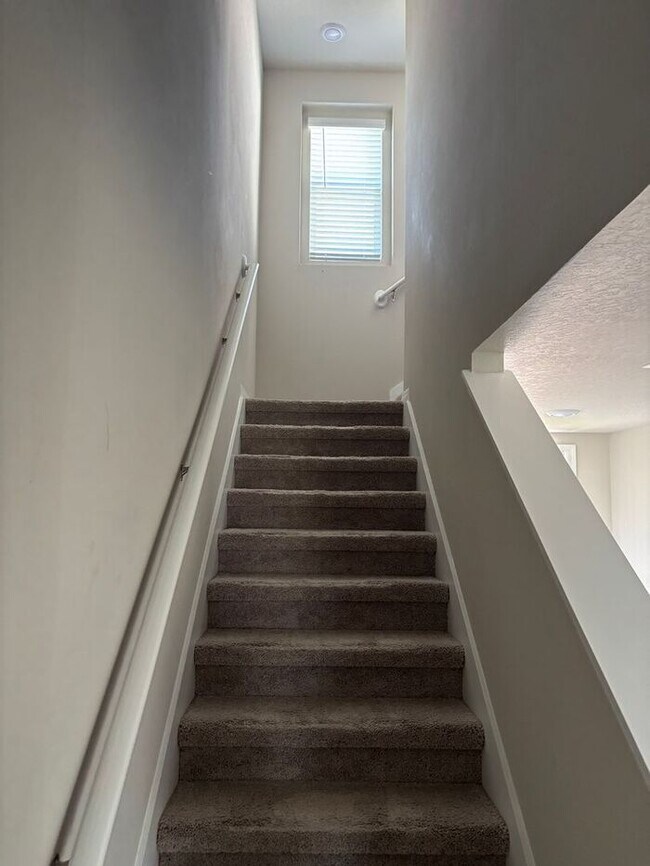 Building Photo - Like-New 4 Bedroom 3 Bath with Pond View & Two Living Spaces — Minutes to South Lake Nona