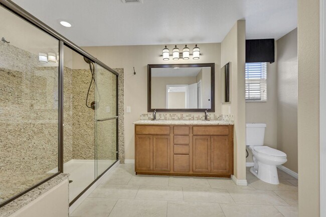 Building Photo - Southern Highlands: Spacious 4-Bedroom Home in a Gated Community with Upstairs Loft, Private Back...