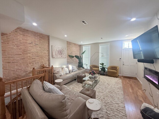 Building Photo - East District 3 BR/3.5 BA End Row Home w-Private Parking