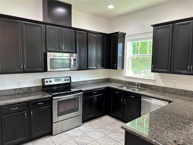 Building Photo - 9350 Woodcrane Dr
