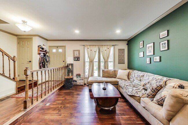 Building Photo - COMINGS SOON - Beautifully Updated Winchester-Built Townhome Backing to Serene Parkland.