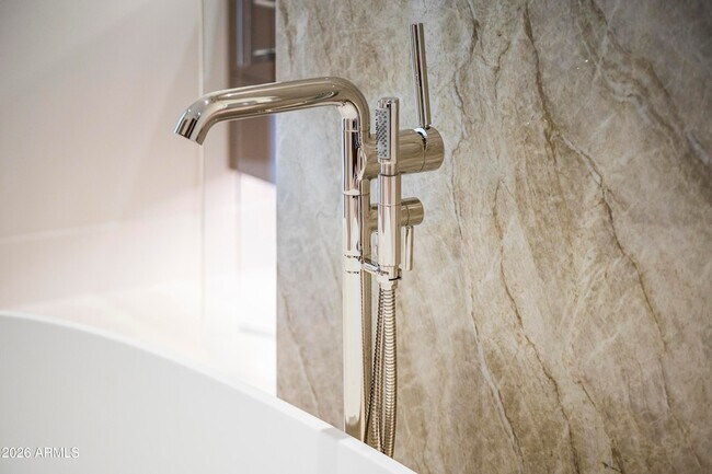 Building Photo - 6587 N Palmeraie Blvd