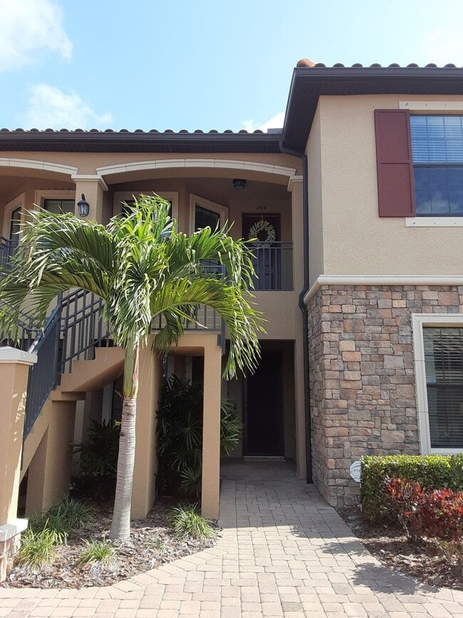 Building Photo - Seasonal/short term turnkey furnished Incredible 2/2 with den ground floor condo in resort Esplan...