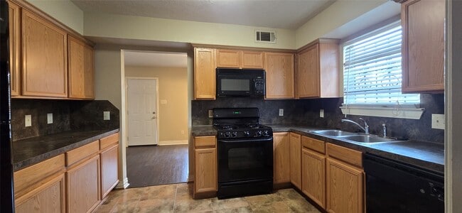 Building Photo - 7929 Comal St