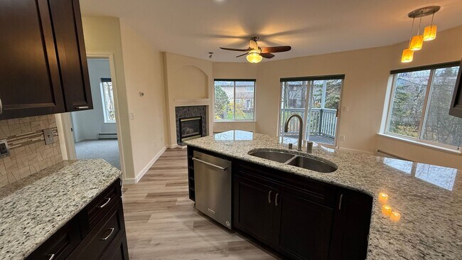 Building Photo - Major Updates! Raised Ranch Style Condo wi...