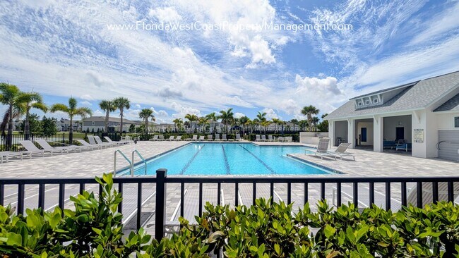 Building Photo - EXCEPTIONAL AND SPACIOUS FURNISHED TOWNHOME WITHIN WATERSIDE- NAUTIQUE!