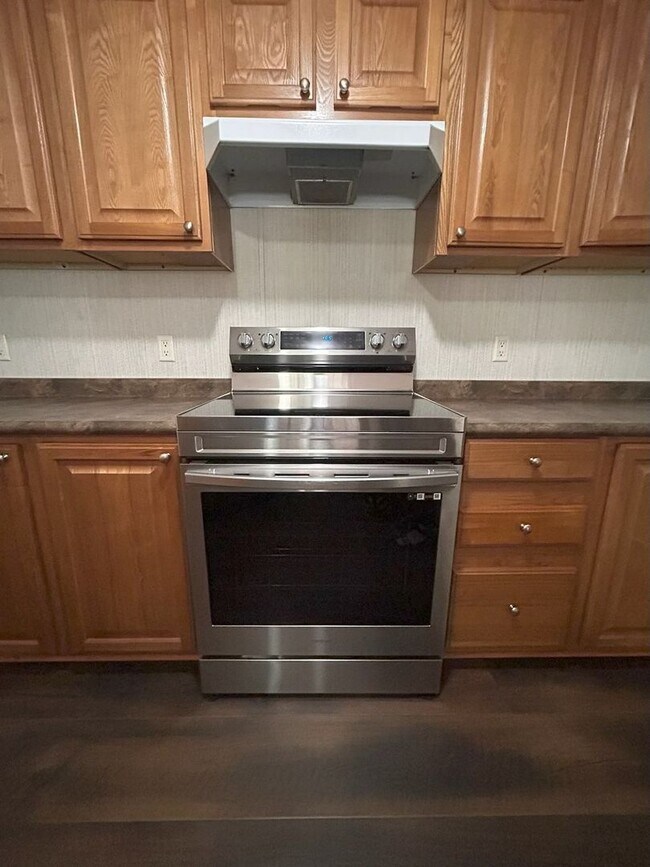 Building Photo - Immaculate 4BR Mobile Home in the heart of...