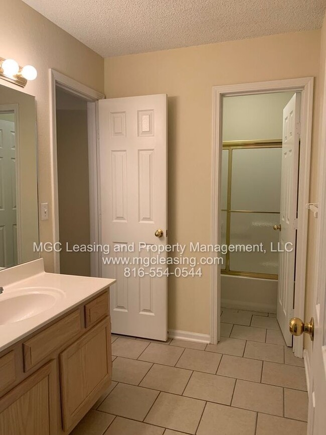 Building Photo - Welcome to Whispering Winds Townhomes – Wh...