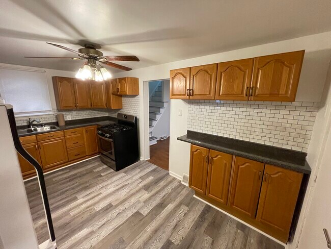 The coffee bar offers additional counter and cabinet space - 212 Lorenz Ave