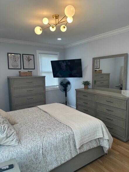 Spacious primary bedroom, overlooking the back yard - 859 Avenue C