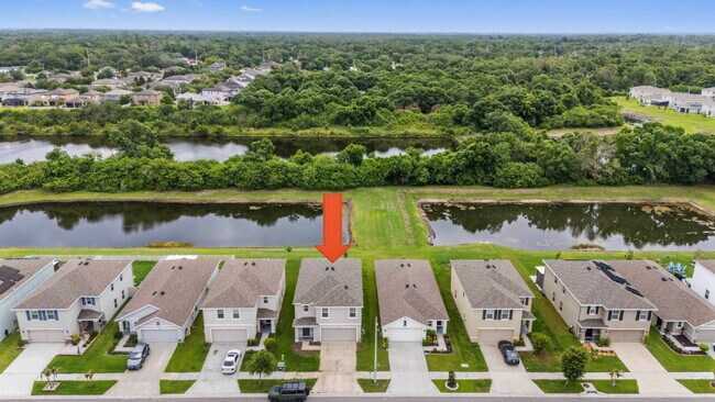 Building Photo - "Spacious 5-Bedroom Haven with Stunning Lake Views & Granite Elegance in Riverview!"