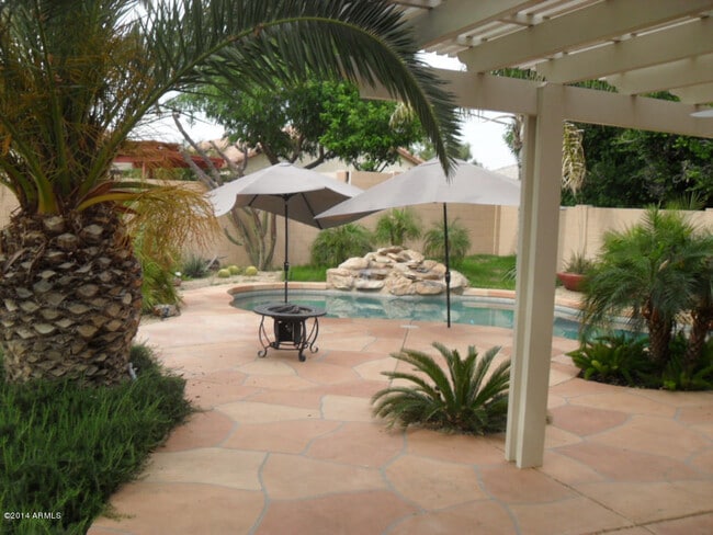 Building Photo - Resort Style Palm Valley Home With A Pool!