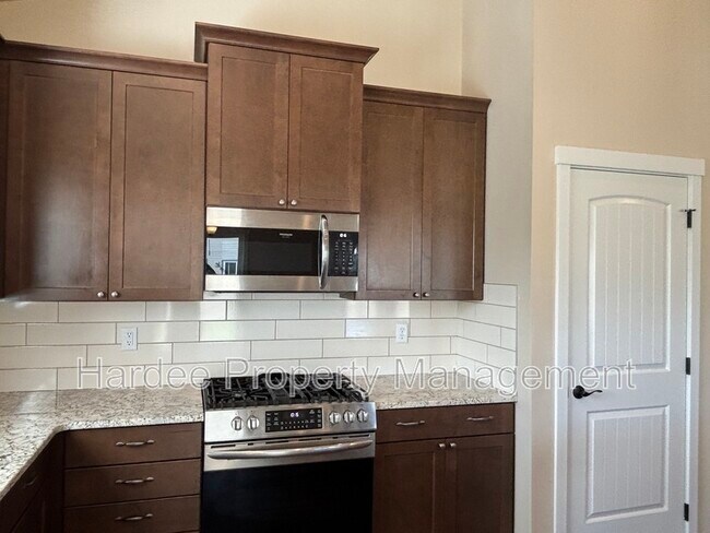 Building Photo - 9070 W Songwood Dr