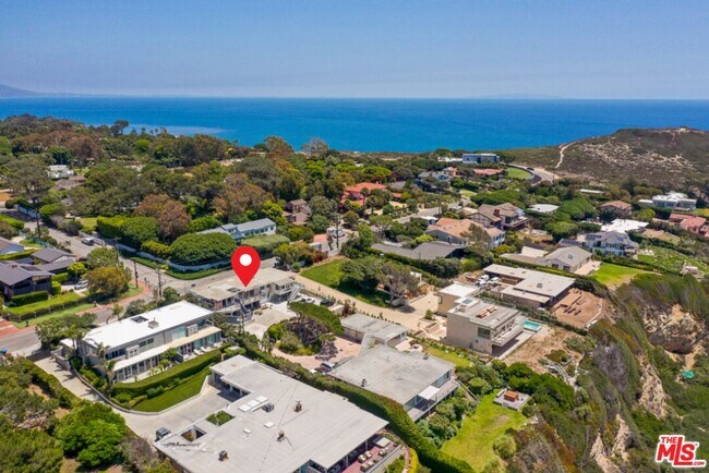 Building Photo - 7275 Birdview Ave