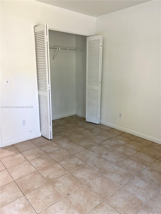 Building Photo - 6452 Royal Palm Beach Blvd