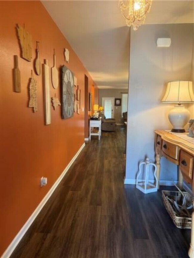 Building Photo - Welcome home to this **beautiful 4-bedroom, 2-bath rental