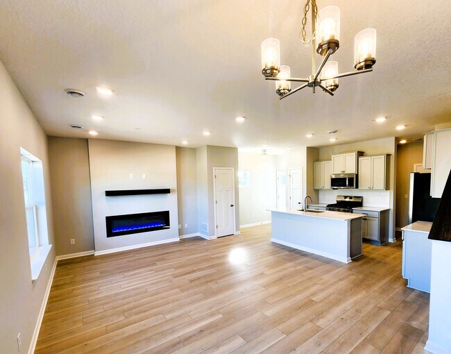Informal dining room flowing into the living room - 13616 Busch Ln