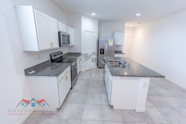 Building Photo - 1673 N Wrigley Dr