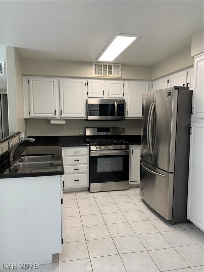 Building Photo - 5710 E Tropicana Ave