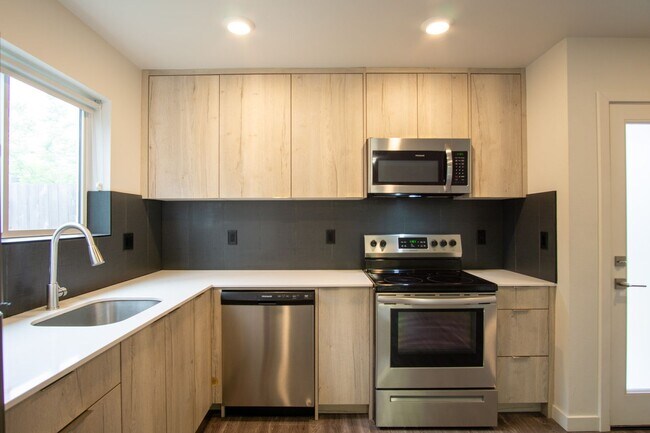 Building Photo - Stylish + Modern Corner 2-Bedroom Townhouse!