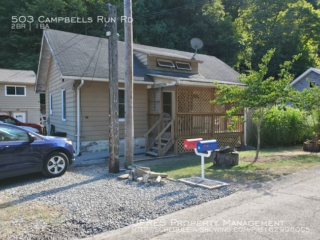 Building Photo - Cute and Cozy Harmar Home