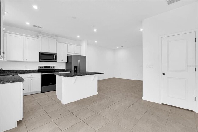 Building Photo - 1104 Lakeshore Breeze Pl