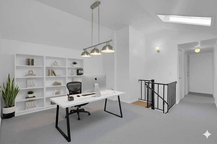 Open loft area offering versatile space for living, work, or recreation. - 3320 Richmond Ct